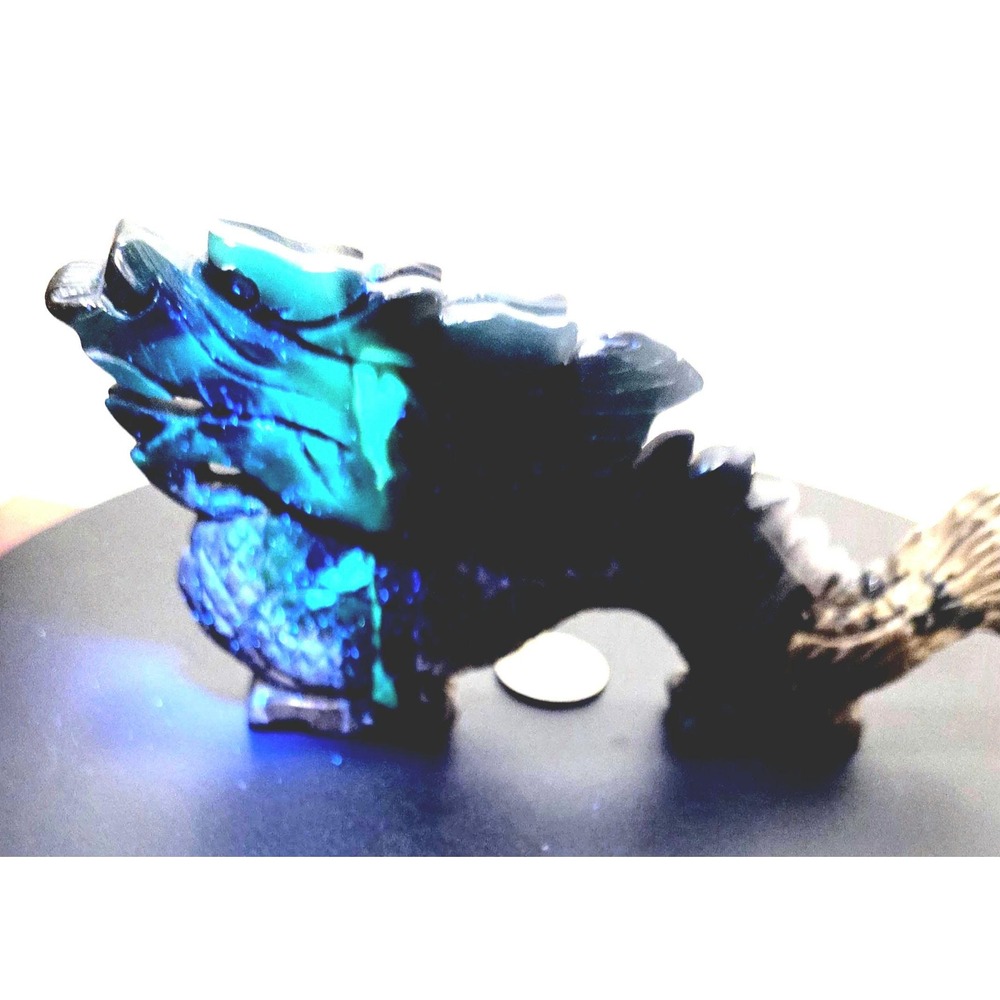 Volcanic Agate Dragon, Extremely UV Reactive. Hand Carved Earth Tones